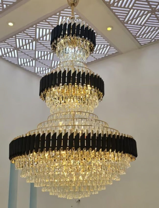double height crystal chandelier for staircase and luxury foyer lighting